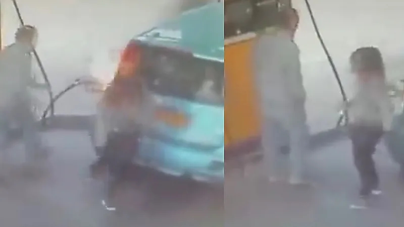 سيدة تشعل النيران في محطة بنزين بسبب رفض رجل إعطائها سيجارة ..فيديو