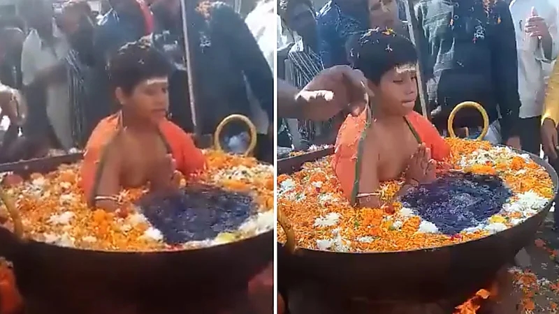 شاهد.. طفل يجلس في إناء به ماء مغلي والنار أسفله دون أن يشعر بشئ