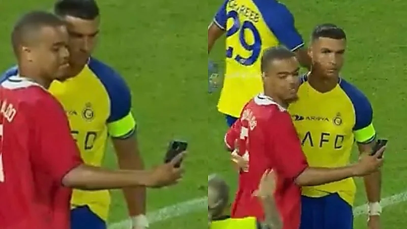 رونالدو يلبي طلب مشجع اقتحم مباراة بنفيكا بقميص مانشستر يونايتد .. فيديو