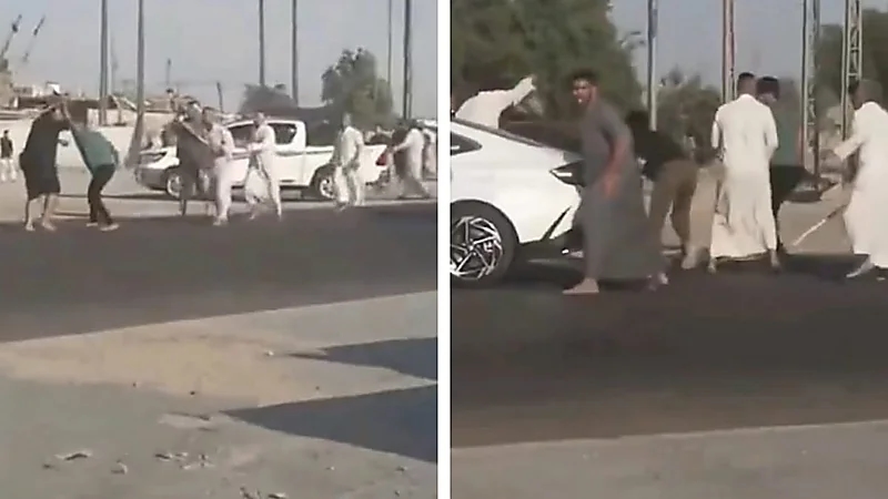 مشاجرة عنيفة بين مجموعة من الشباب في شوارع البصرة في وضح النهار .. فيديو