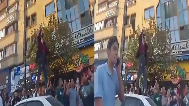 فتاة تخلع حجابها علنًا في طهران وتتحدى قوات الأمن: خامنئي سيموت ألف مرة.. فيديو