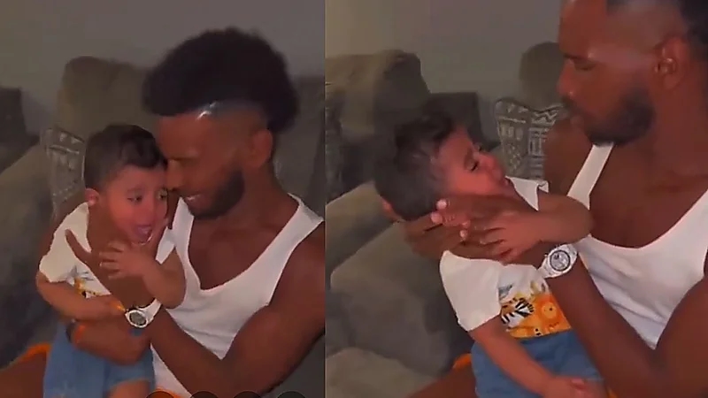 البليهي يحمل طفل صغير ويلاعبه ويقبله .. فيديو
