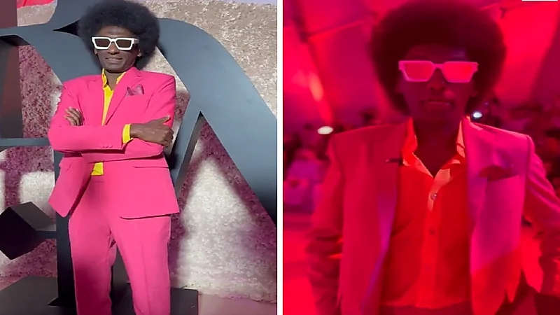 زائر في أسبوع الموضة بالرياض يخطف الأنظار ببدلة وردية.. فيديو