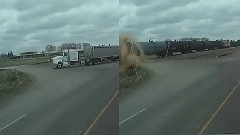 لحظة اصطدام مرعبة بين قطار شحن ومركبة .. فيديو