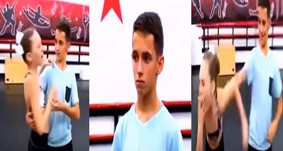 رد فعل صادم لفتاة قبلها زميلها أثناء الرقص
