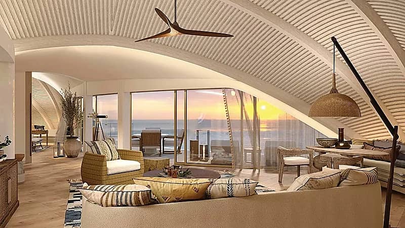 لقطات من الفلل الفندقية العائمة والشاطئية في منتجع محمية جزيرة ريتز كارلتون .. صور