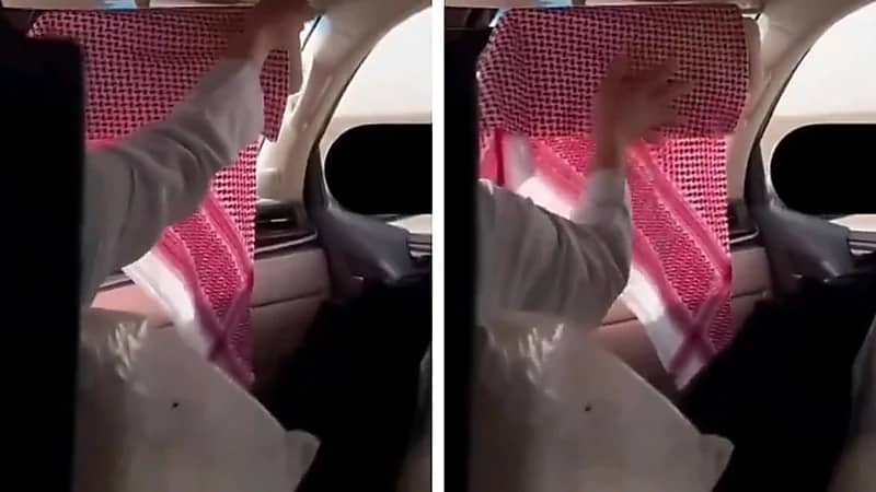 رجل يستخدم الشماغ لحماية زوجته من أشعة الشمس ..فيديو