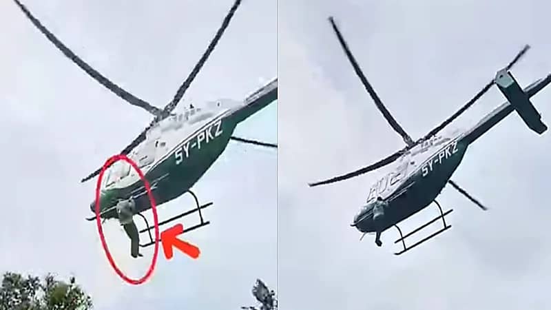شاب يتمسك بطائرة هليكوبتر لحظة إقلاعها في حفل زفاف.. فيديو