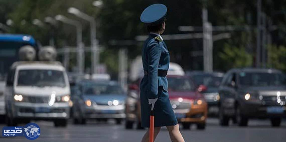 بالصور.. حسناوات يشرفن على حركة المرور بكوريا الشمالية