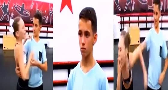 رد فعل صادم لفتاة قبلها زميلها أثناء الرقص