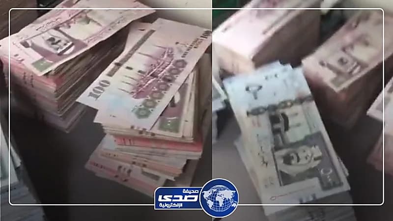 شكل النقود من فئة الـ500 و 100 داخل خزانة مصرف..فيديو وصور