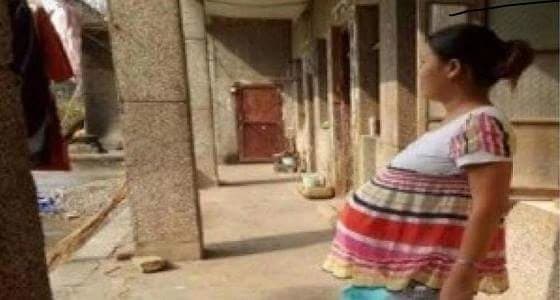 إمرأة  تحطم الرقم القياسي في حملها