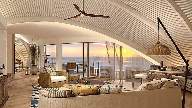 لقطات من الفلل الفندقية العائمة والشاطئية في منتجع محمية جزيرة ريتز كارلتون .. صور